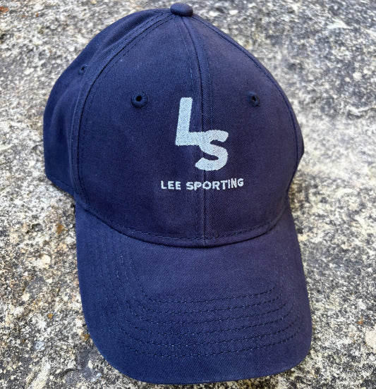 Sportsman Structured Baseball Cap. Cotton, with adjustable metal closure. Hat is navy blue with an embroidered Lee Sporting logo in silver (non metallic) thread